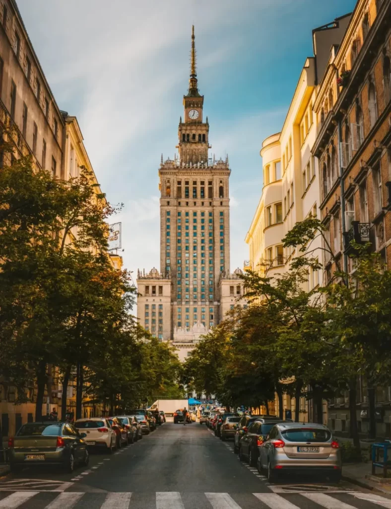 Palace of Culture and Science in Warsaw surrounded by historic buildings, representing Polish pride and RYZEAL SOURCING’s apparel manufacturing connection